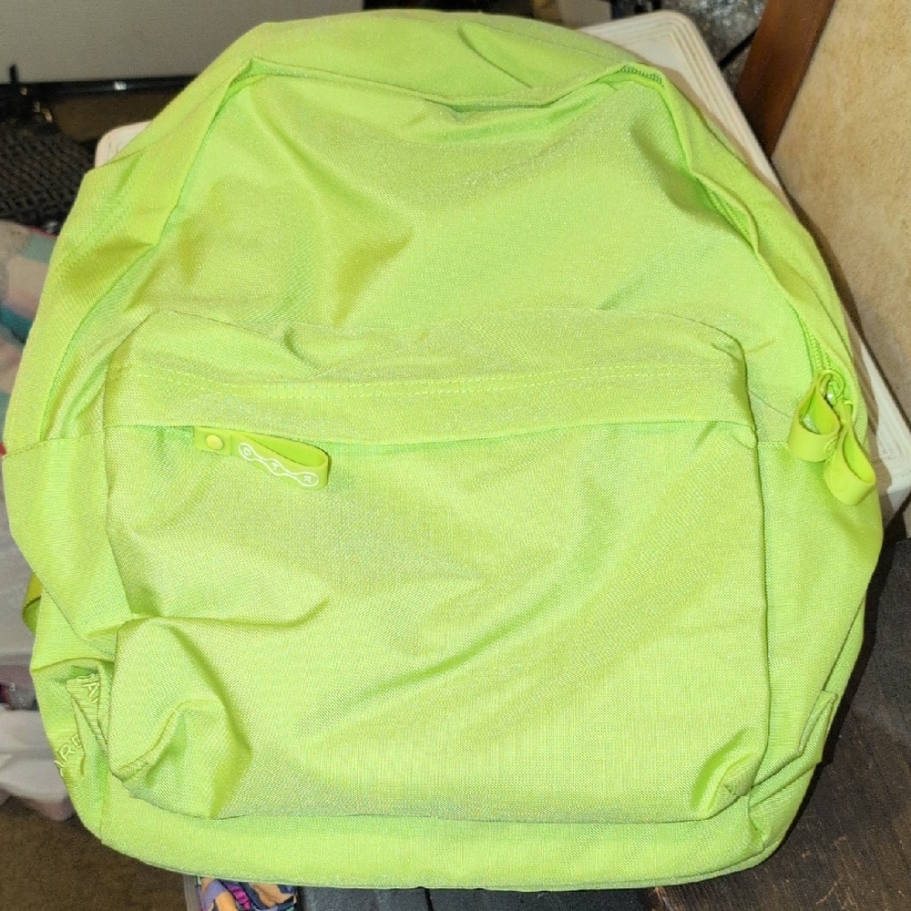 Brand New DTR Bookbag. Bright Lime Green. All Zippers Work. Has Never Been Used.